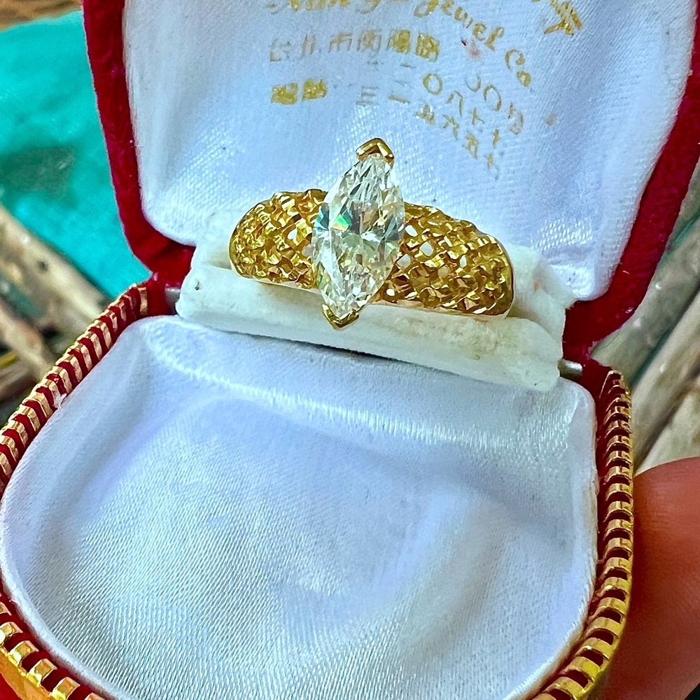 Gold Marquise Cut Ring with Intricate Band
